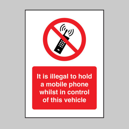 It is illegal to hold a mobile phone whilst in control of this vehicle (self adhesive vinyl safety label)