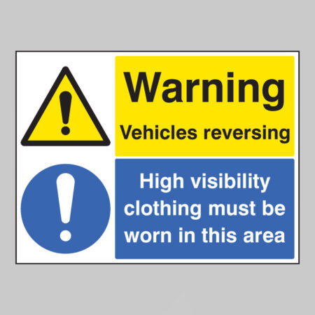 Warning vehicles reversing high visibility clothing must be worn in this area
