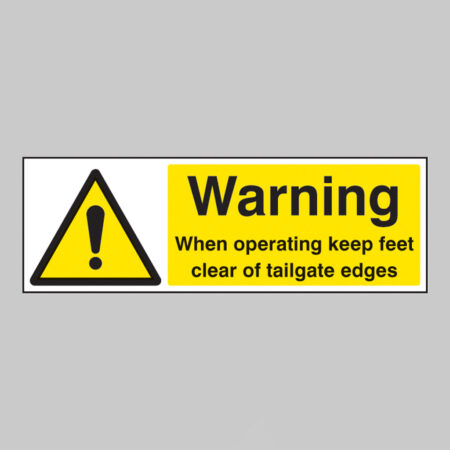 Warning when operating keep feet clear of tailgate edges