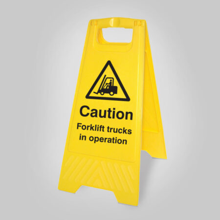 Caution forklift trucks in operation (free-standing yellow floor sign)