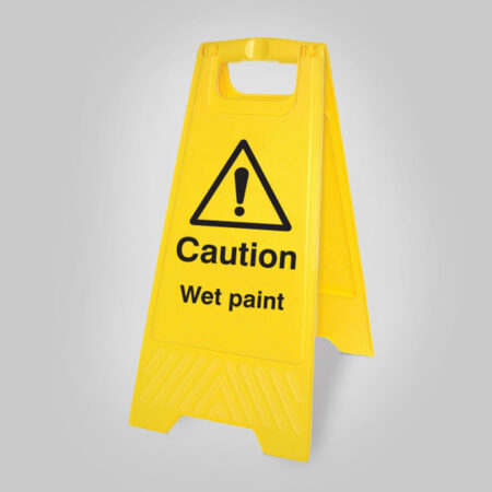 Caution wet paint (free-standing yellow floor sign)