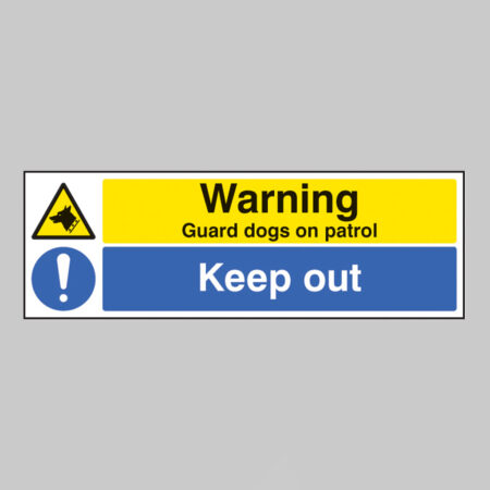 Warning guard dogs on patrol keep out